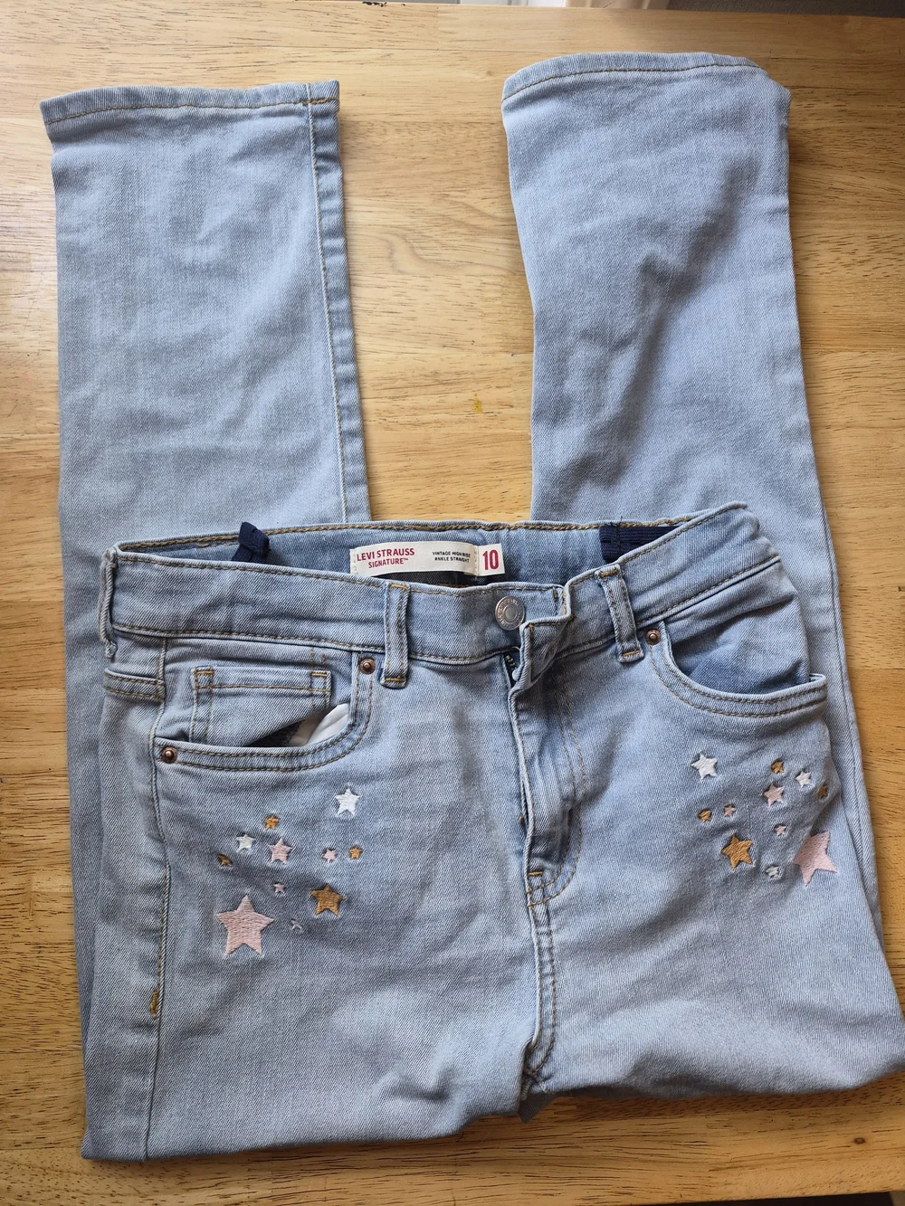 Levi's Light Wash High-Rise Jeans with Star Embroidery
